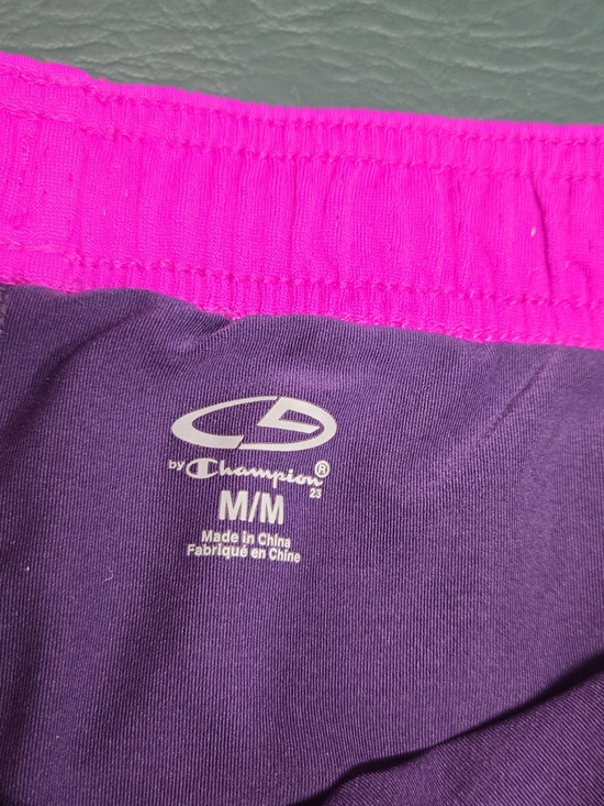 **Champion Women’s Athletic Mesh Shorts in Hot Pink with Dark Purple Trim** - Picture 2 of 3
